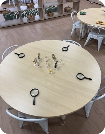 Round table with magnifying glasses