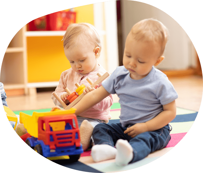 Toddlers playing with toys