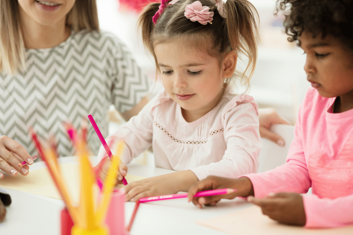 Child drawing with a pencil