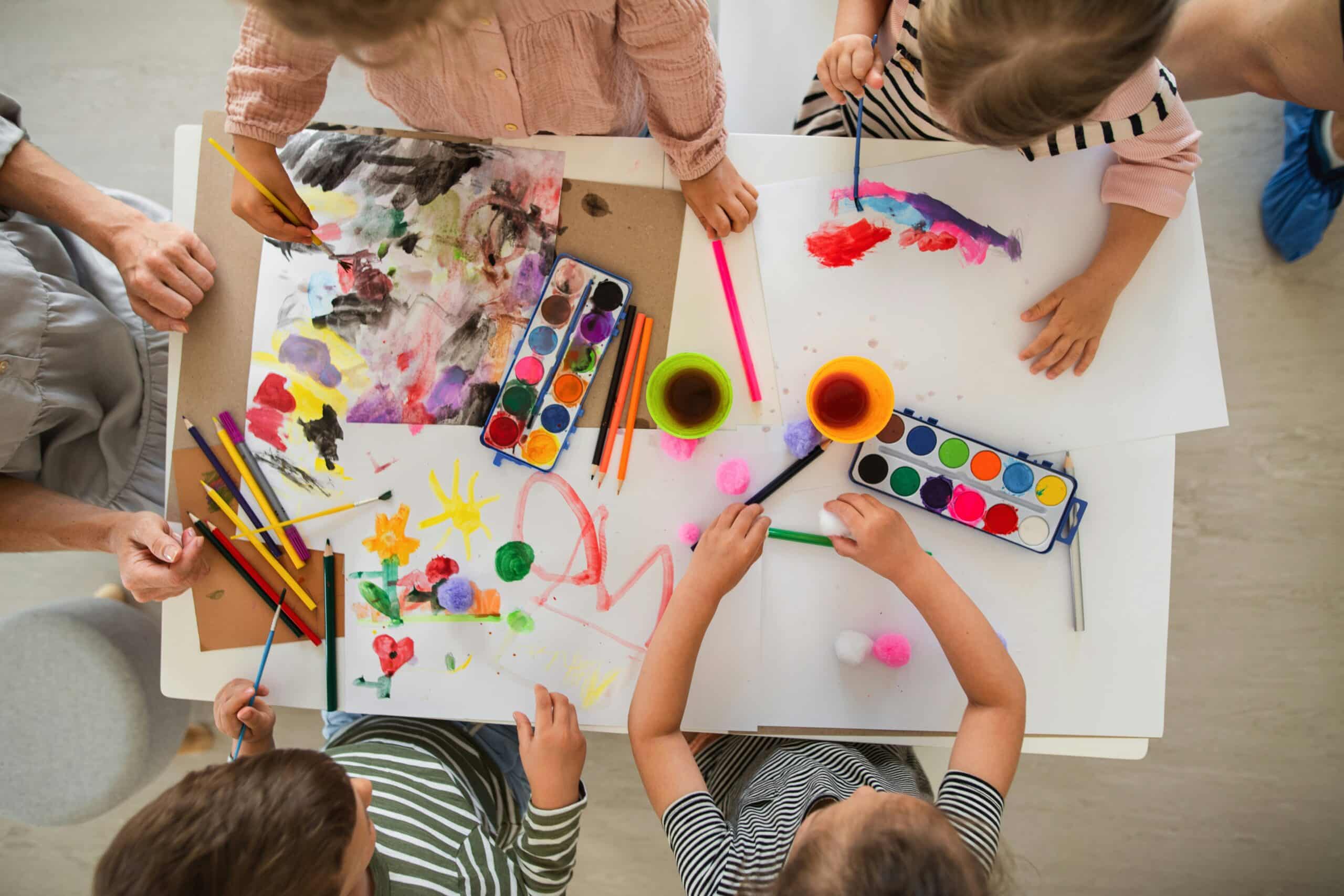 Children painting and drawing