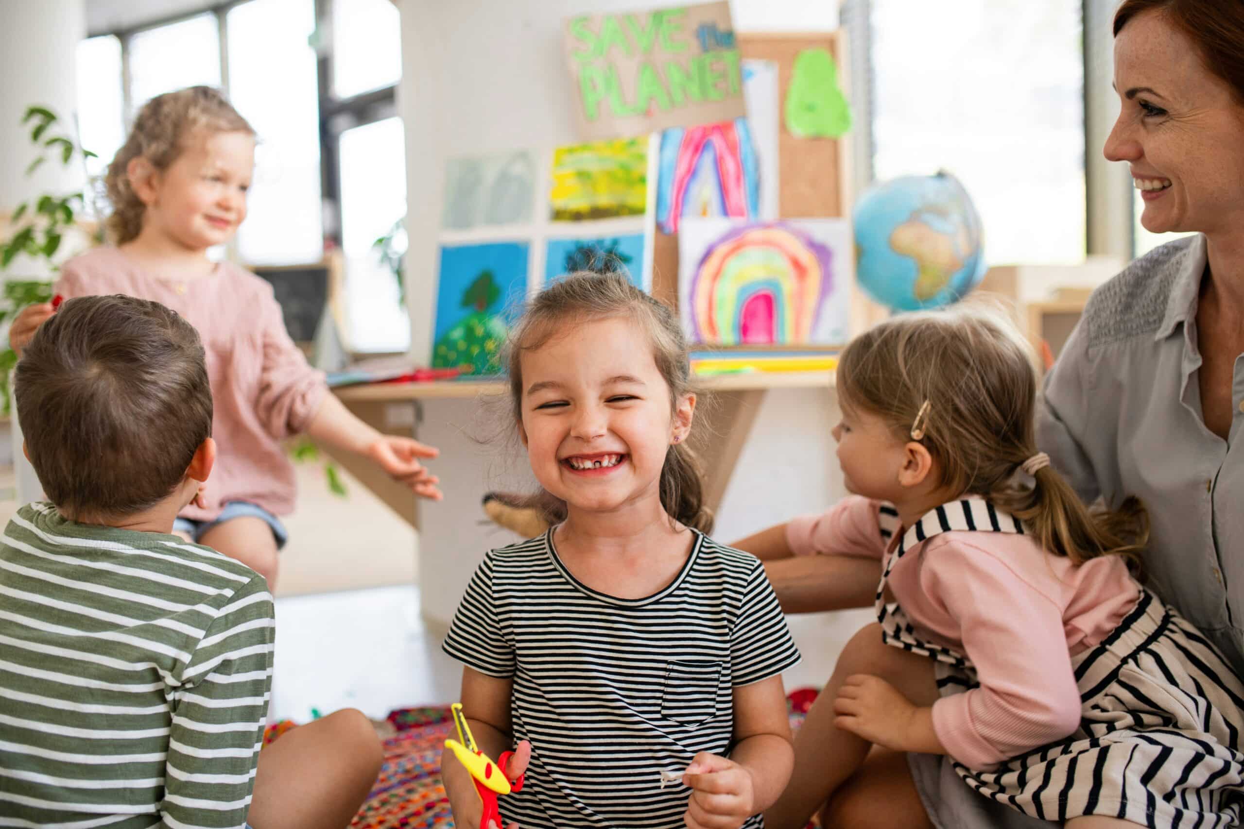 Happy child smiling in classroom