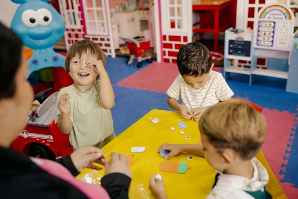 Children playing at a table